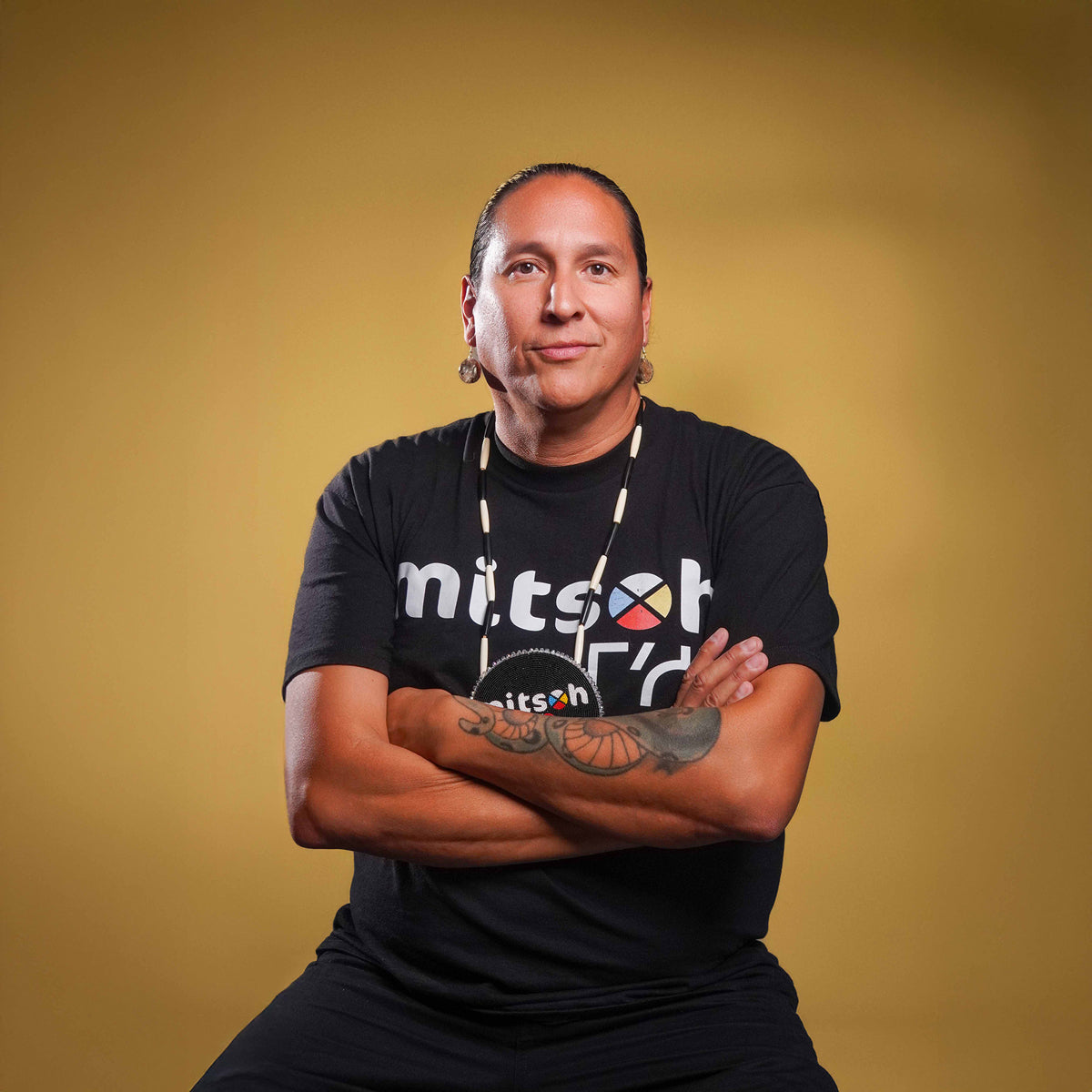 Portrait of Mitsoh founder Ian Gladue wearing a Mitsoh shirt