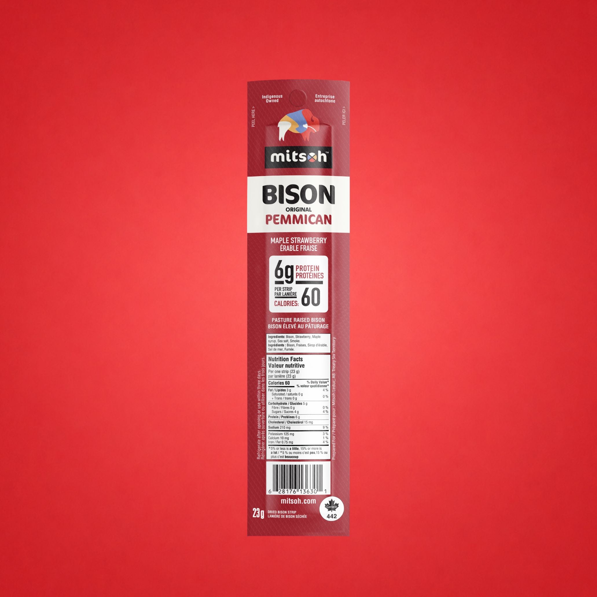 Single Original Strawberry Bison Pemmican strip on a red background