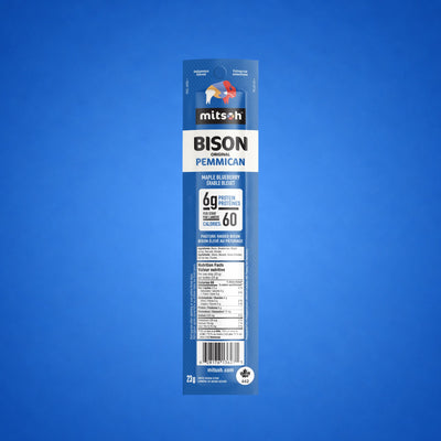 Single Original Blueberry Bison Pemmican strip on a blue background